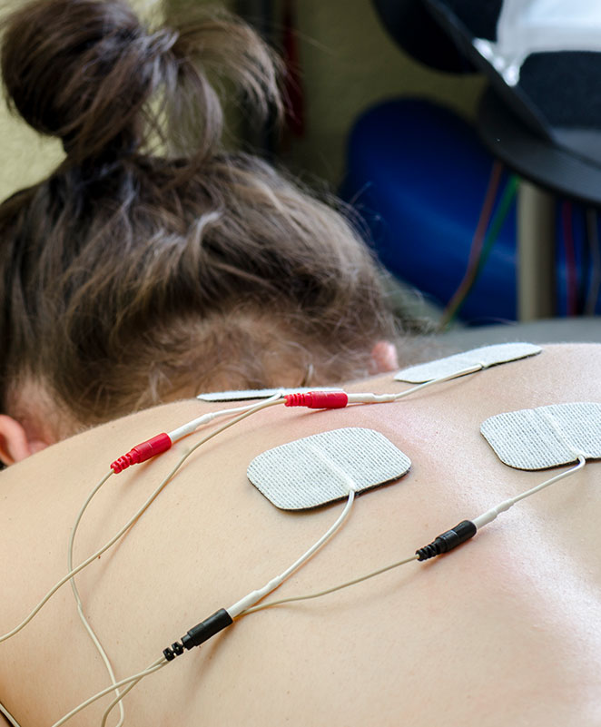 Electrical stimulation/interferential therapy
